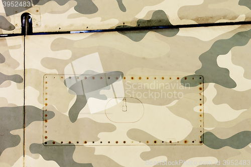 Image of Piece of aircraft grunge metal background, army camo