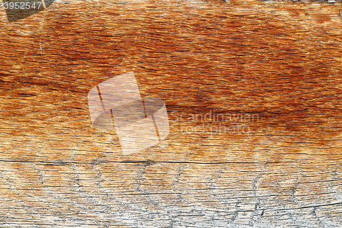 Image of old reddish wooden plank texture