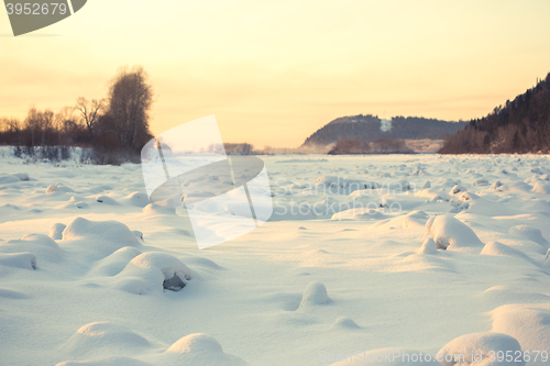 Image of landscape. weather, snowdrifts in the foreground