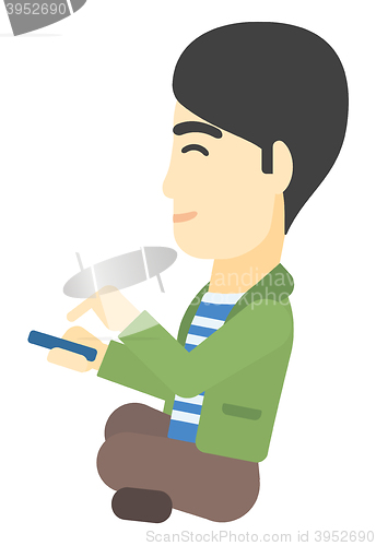 Image of Man using mobile phone.