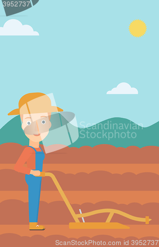 Image of Farmer on the field with plough.