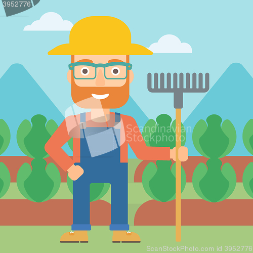 Image of Farmer with rake.