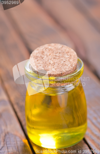 Image of oil in glass bottle