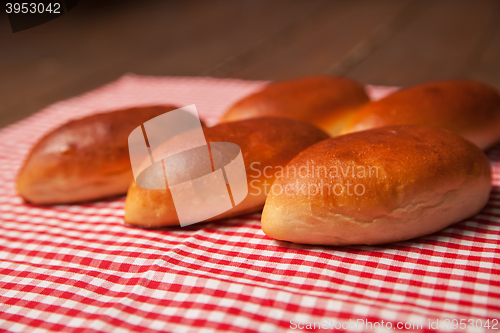 Image of Pies of puff pastry close up on an table. 