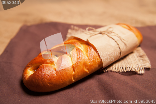 Image of Poppy roll on brown napkin