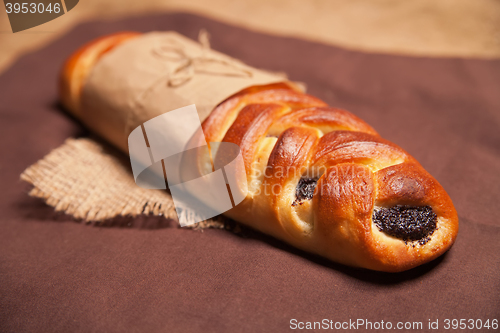 Image of Poppy roll on brown napkin