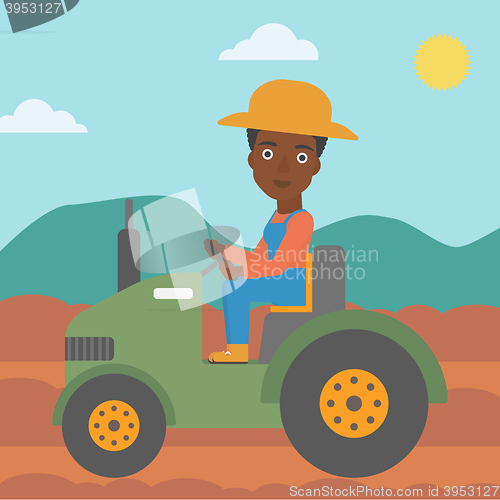 Image of Farmer driving tractor.