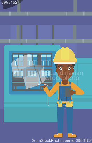 Image of Electrician with electrical equipment.