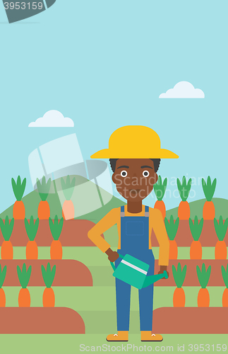 Image of Farmer with watering can.