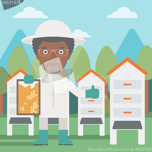 Image of Bee-keeper at apiary.