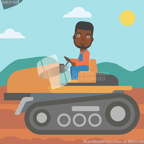 Image of Farmer driving tractor.