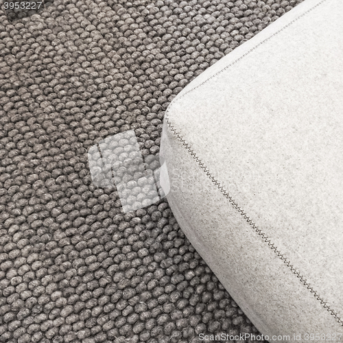 Image of Soft seat on gray carpet