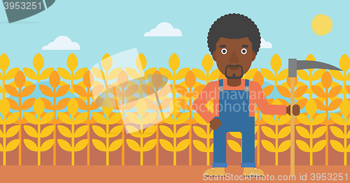 Image of Farmer on the field with scythe.