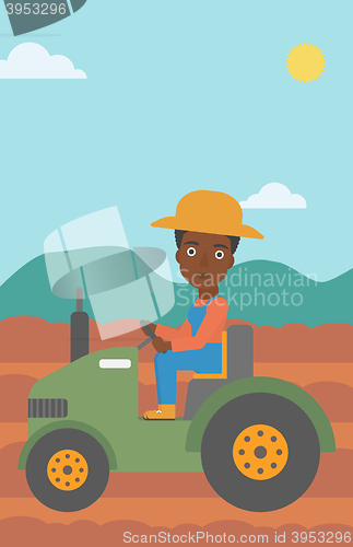 Image of Farmer driving tractor.