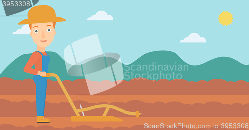 Image of Farmer on the field with plough.