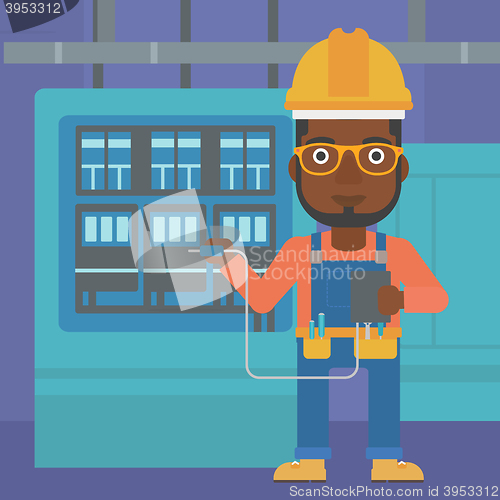 Image of Electrician with electrical equipment.