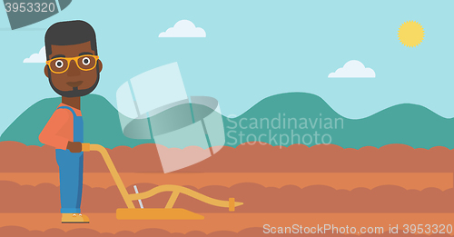 Image of Farmer on the field with plough.