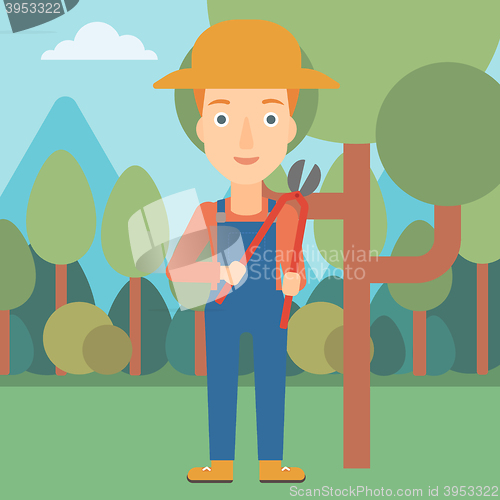 Image of Farmer with pruner in garden.