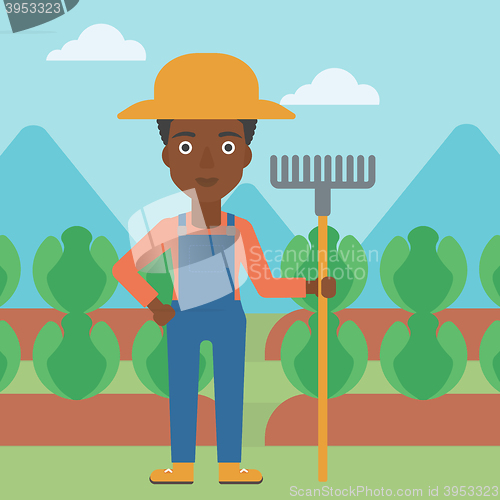 Image of Farmer with rake.