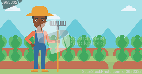 Image of Farmer with rake.