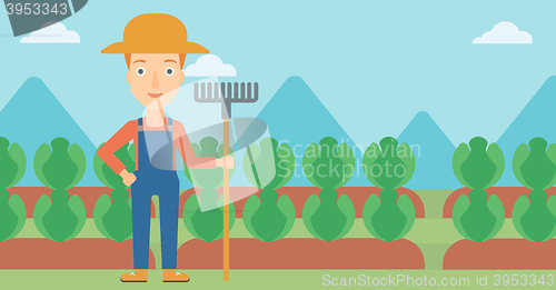 Image of Farmer with rake.