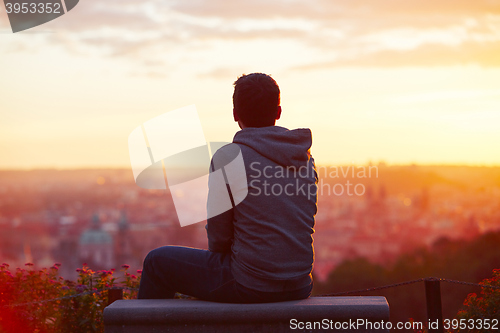 Image of Man at the sunrise.