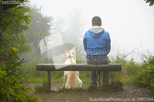 Image of Lost man with his dog