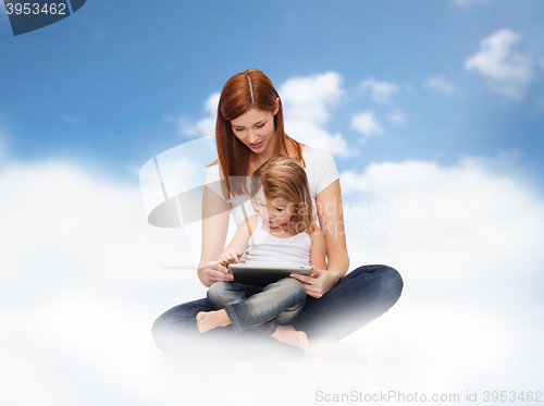 Image of happy mother and little girl with tablet pc