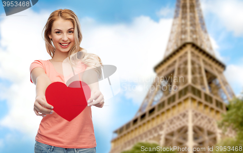 Image of happy woman or teen girl with red heart shape