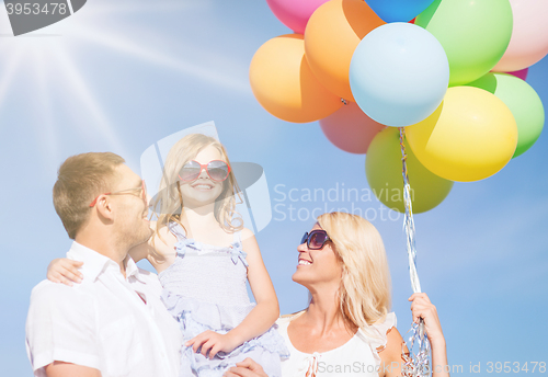 Image of family with colorful balloons