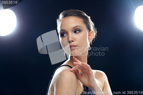 Image of beautiful young asian woman with earring