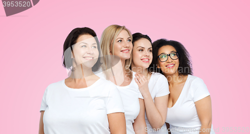 Image of group of happy different women in white t-shirts