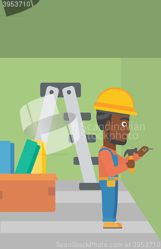 Image of Constructor hammering nail.