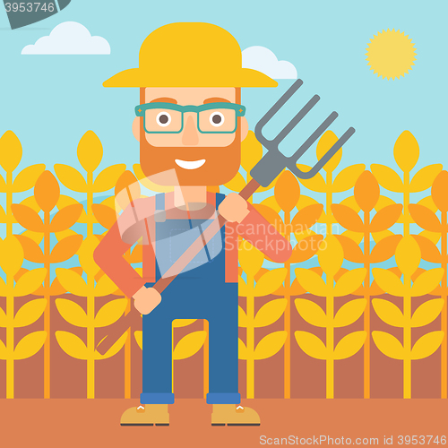 Image of Farmer with pitchfork.