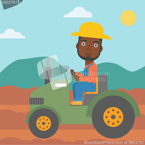 Image of Farmer driving tractor.