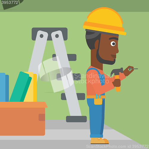 Image of Constructor hammering nail.