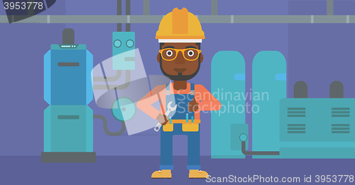 Image of Cheerful repairer with spanner.