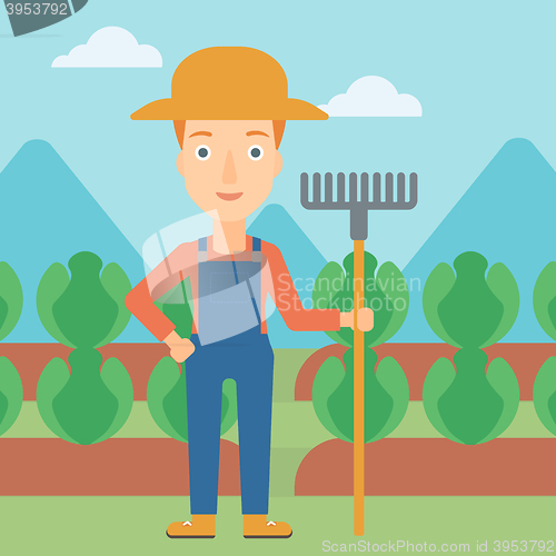 Image of Farmer with rake.