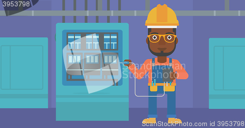 Image of Electrician with electrical equipment.