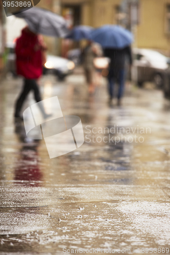 Image of People in rain