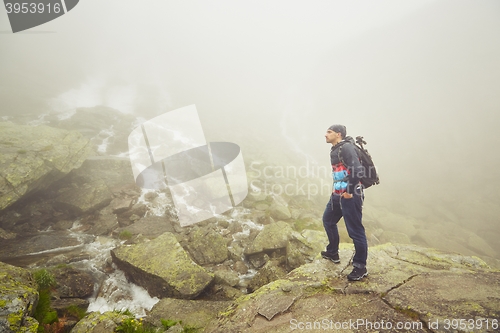 Image of Traveler in mountains