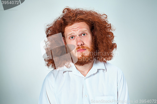 Image of The young man looking at camera