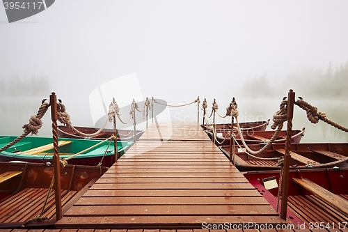 Image of Boats in mysterious fog