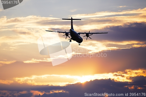 Image of Airplane at the sunset 