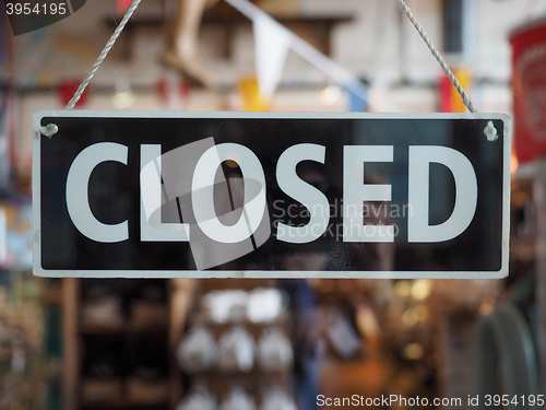 Image of Closed sign on a shop window