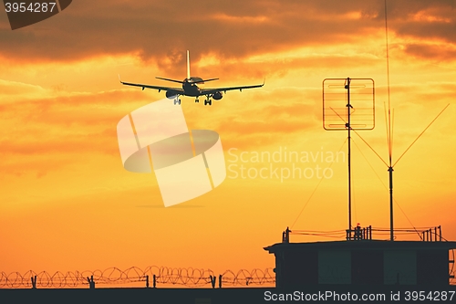 Image of Airplane at the sunset