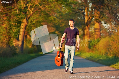 Image of Guy with guitar