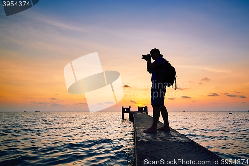 Image of Photographer at the sunset