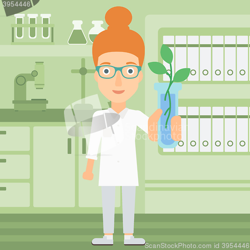 Image of Laboratory assistant with test tube.