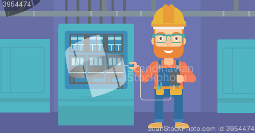 Image of Electrician with electrical equipment.